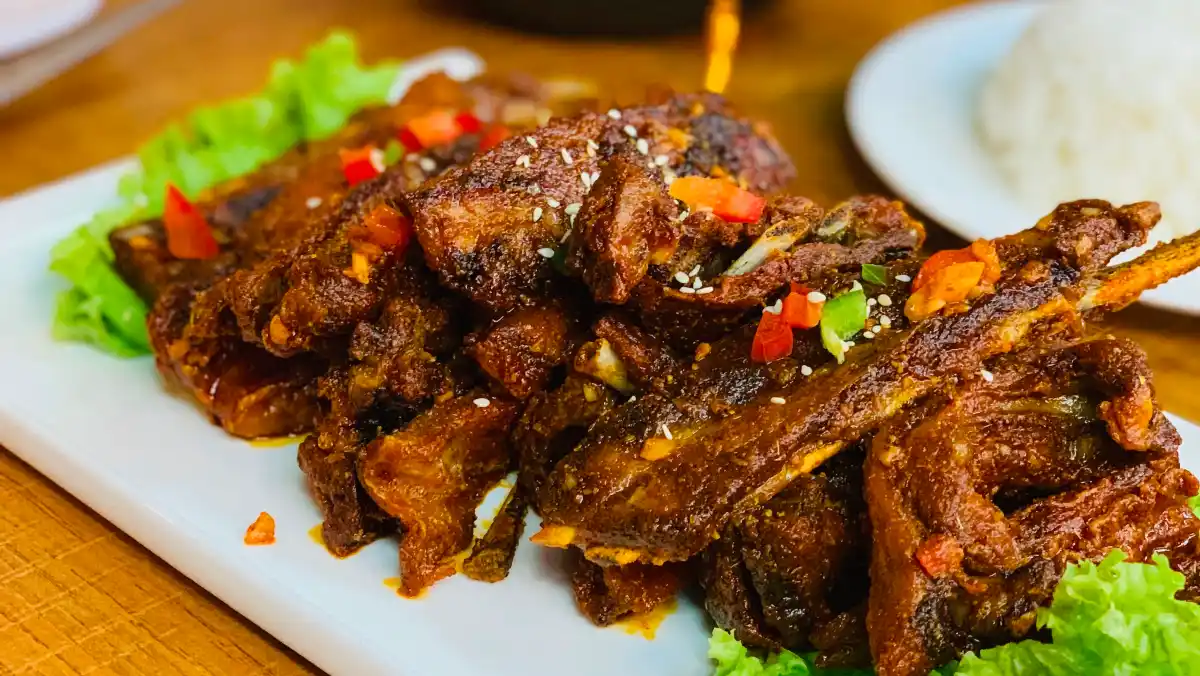 Plate with lamb chops.