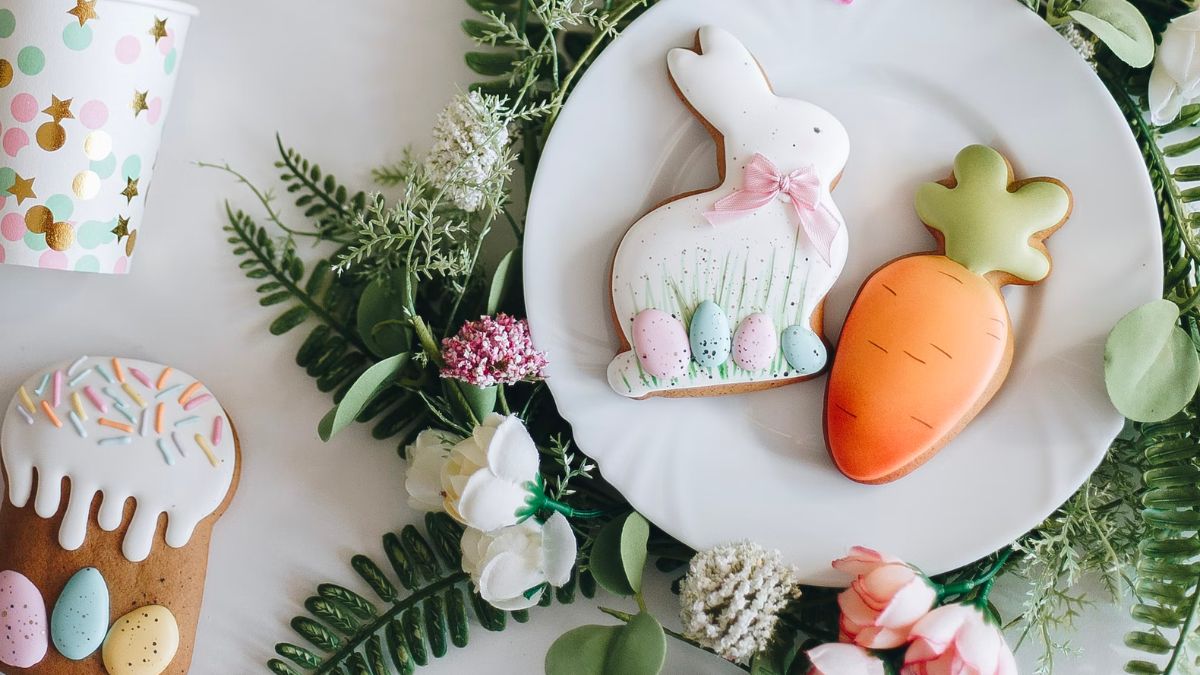 Plate with cookies decorated for easter, a bunny and a carrot.