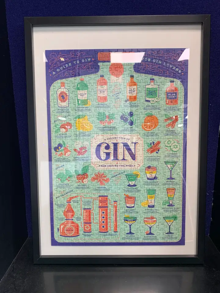 A framed gin puzzle in the EatFirst office