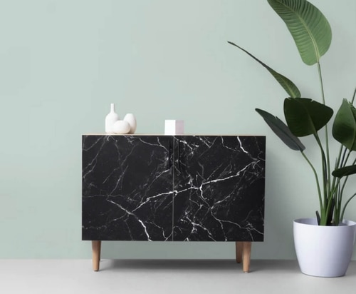 Clean minimalist home interior with non-toxic plant-based cleaning aesthetic