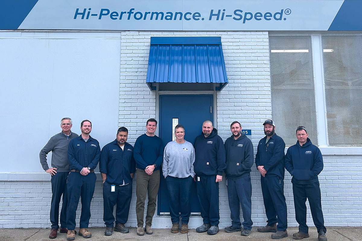 The Hi-Tech Plating team standing in front of their building.