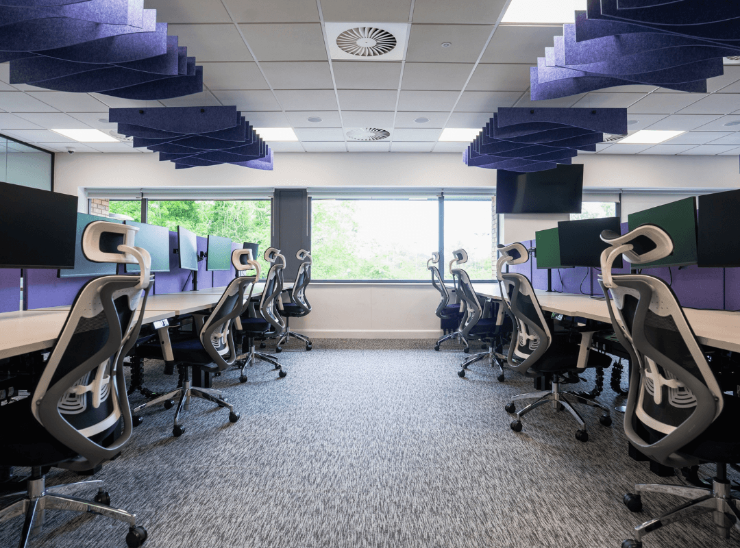 Sit/Stand desking in large office