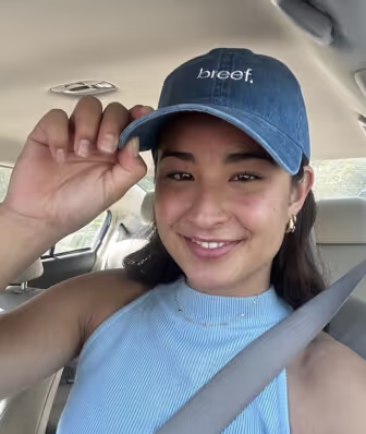 girl with a blue cap