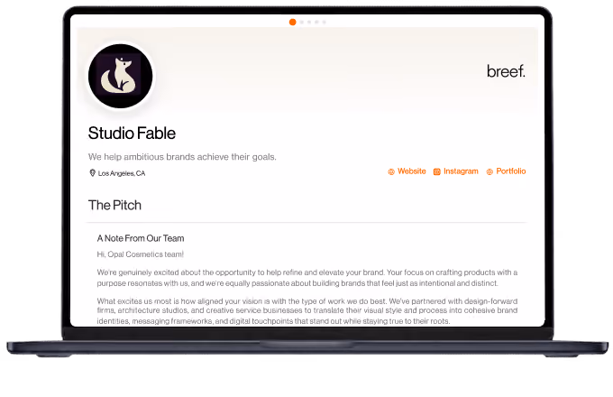 Laptop screen showing Studio Fable webpage with brand pitch and links to website, Instagram, and portfolio.