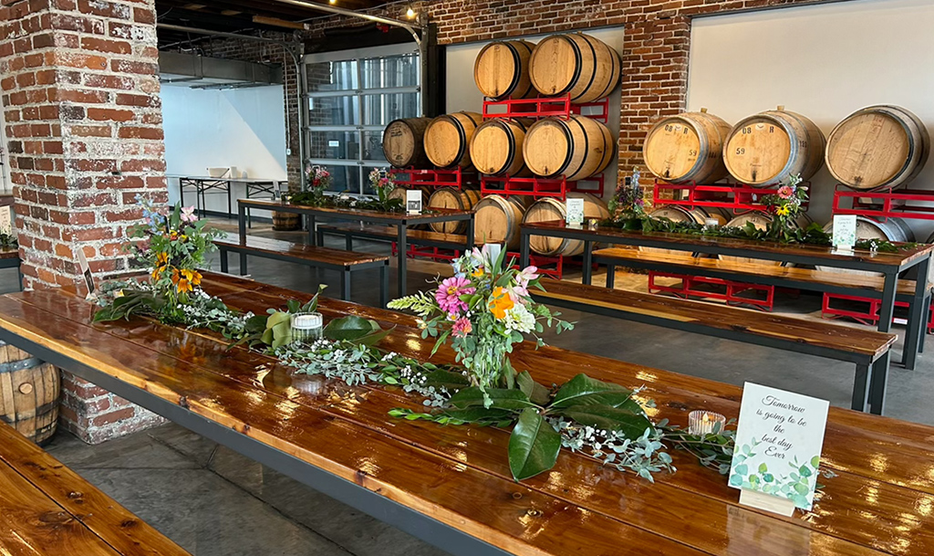 Barrel room with event space with table decorations