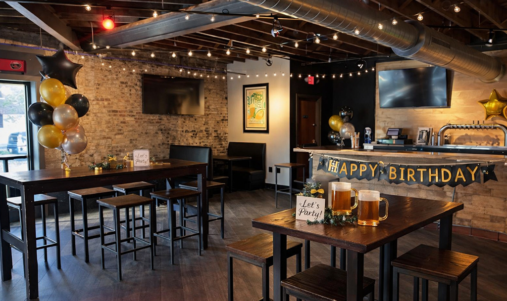 Birthday celebration banners on high tables in a space with high tables and bar