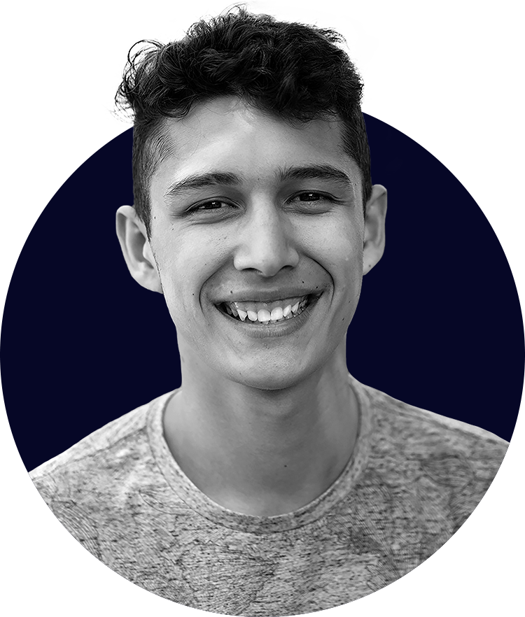 Black and white photo of young man smiling 