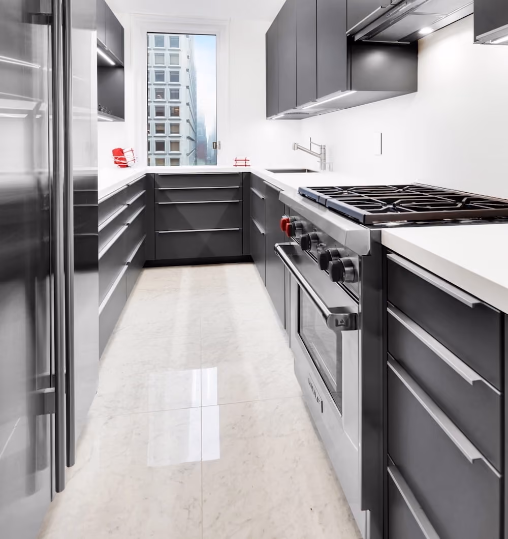 Marble kitchen flooring in a Midtown Manhattan condo renovation, by Gallery KBNY
