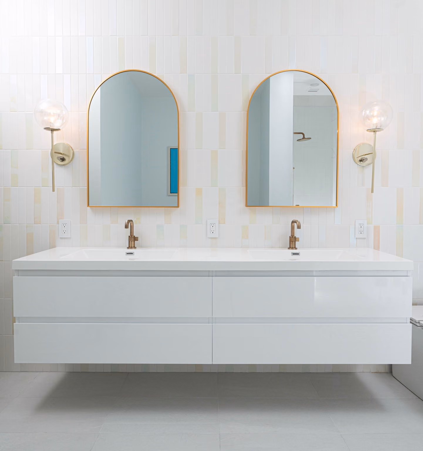 Kids' en suite glow-tile bathroom in a Manhattan condo renovation at 252 Seventh Avenue by Gallery KBNY