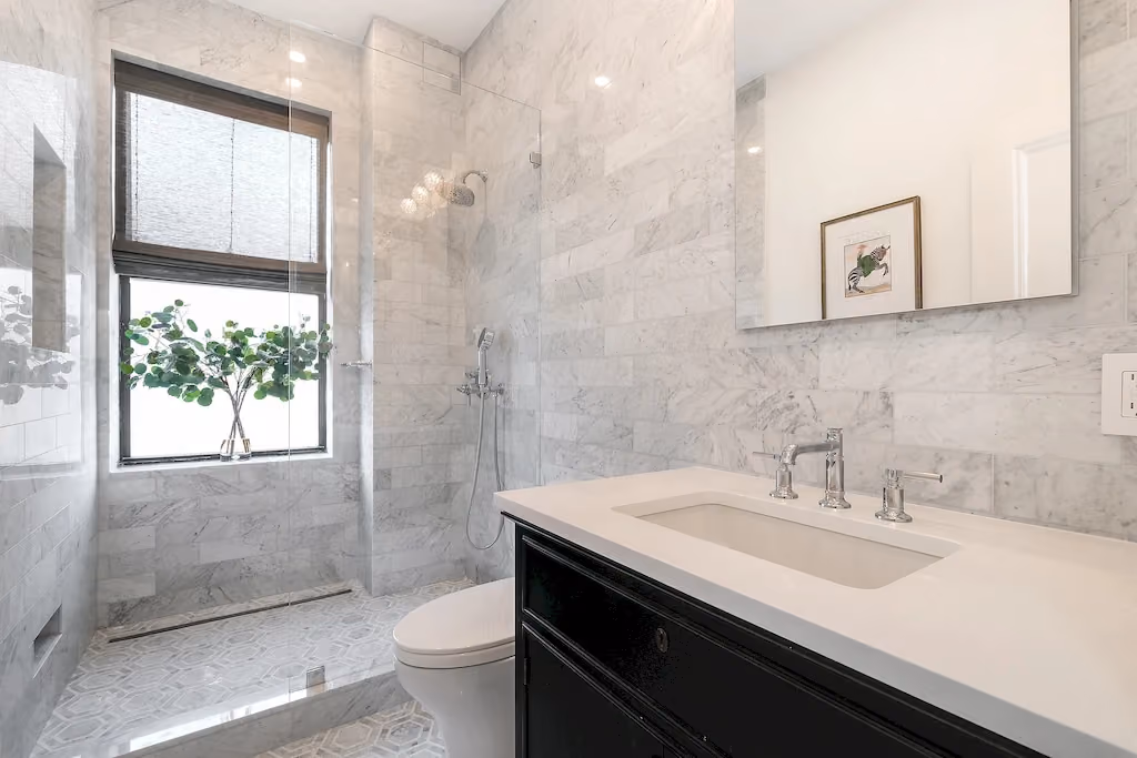 NYC bathroom remodel featuring a frameless glass shower by Gallery KBNY 