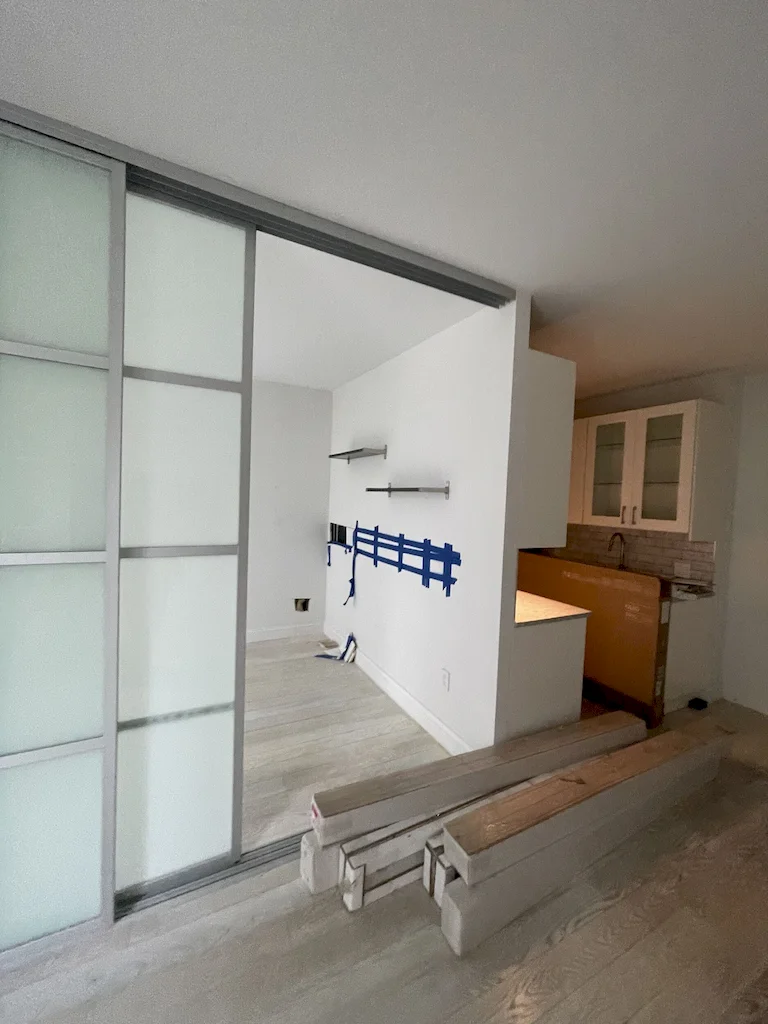 Interior before a townhouse and apartment vertical combination renovation at 328 Albany Street in Battery Park City, Manhattan, by Gallery KBNY (view 1)