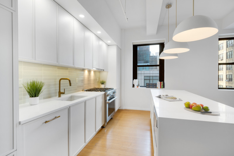 Renovated interior of a loft at BellTel Lofts at 365 Bridge Street in Downtown Brooklyn, by Gallery KBNY (view 4)