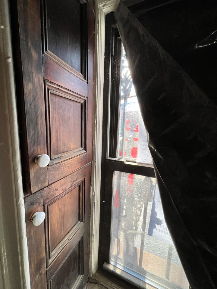 Original wood doors before restoration in a Carroll Gardens brownstone at 347 President Street, Brooklyn, by Gallery KBNY