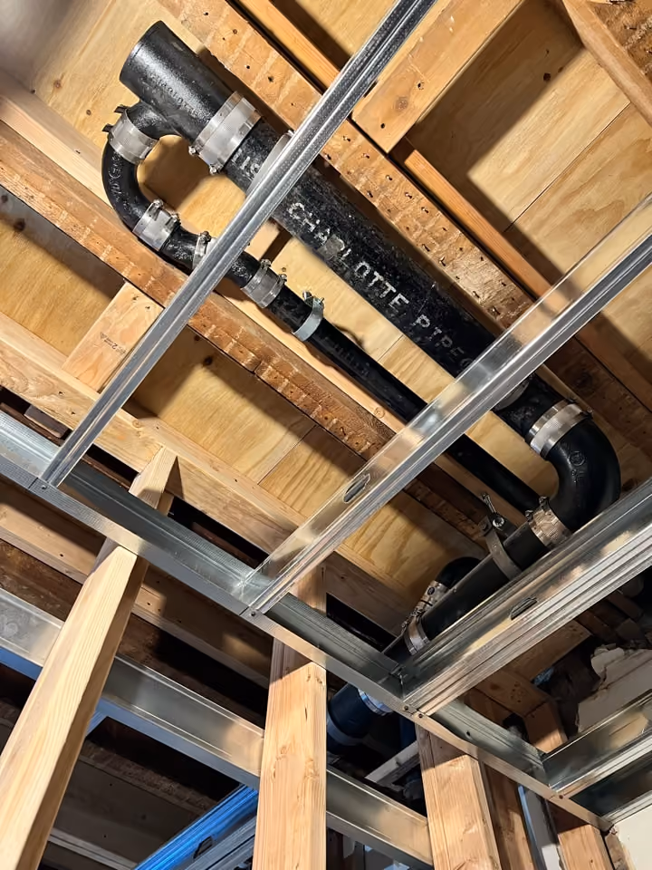 Rough plumbing and mechanical detail during a Carroll Gardens brownstone renovation at 347 President Street, Brooklyn, by Gallery KBNY
