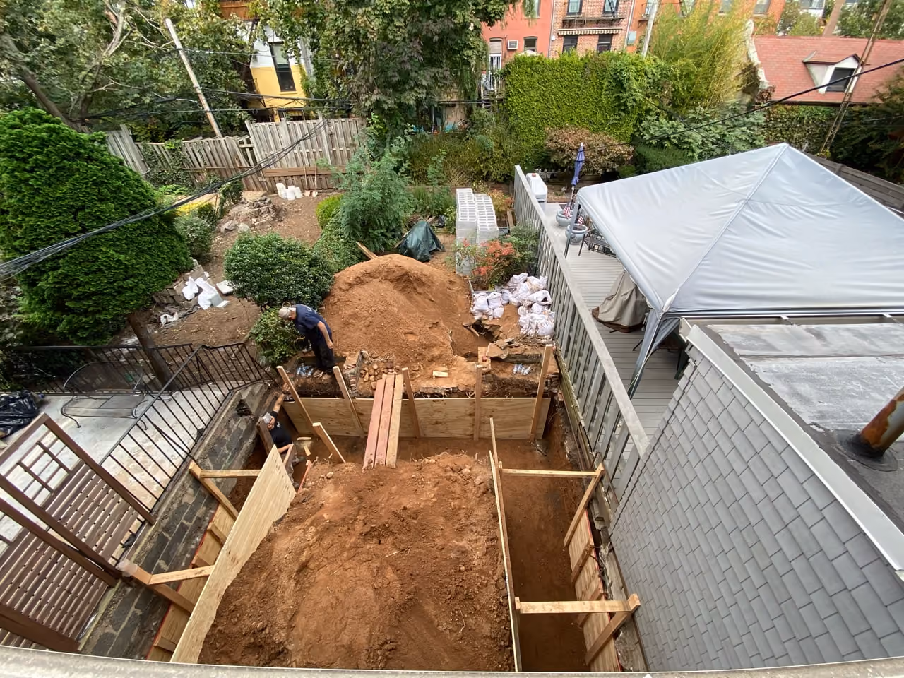 Rear yard and deck construction during a Carroll Gardens brownstone renovation at 347 President Street, Brooklyn, by Gallery KBNY