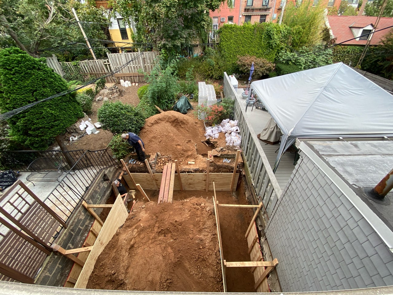 Rear yard and deck construction during a Carroll Gardens brownstone renovation at 347 President Street, Brooklyn, by Gallery KBNY