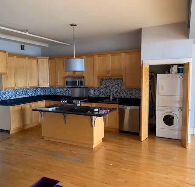Interior before a pre-war condo renovation at The Newswalk at 535 Dean Street in Prospect Heights, Brooklyn, by Gallery KBNY (view 2))