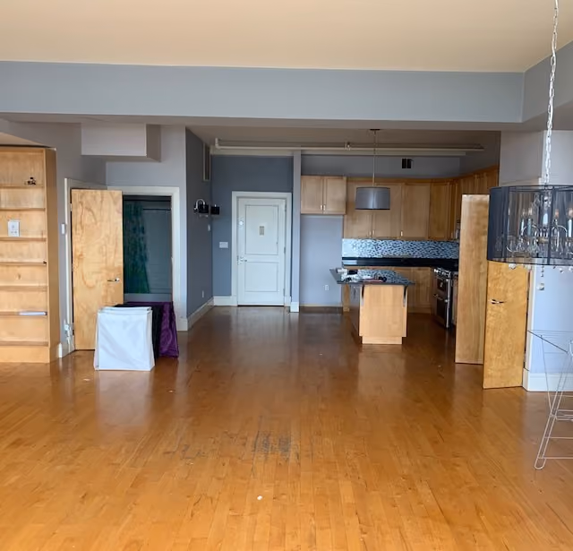 Interior before a pre-war condo renovation at The Newswalk at 535 Dean Street in Prospect Heights, Brooklyn, by Gallery KBNY (view 1)