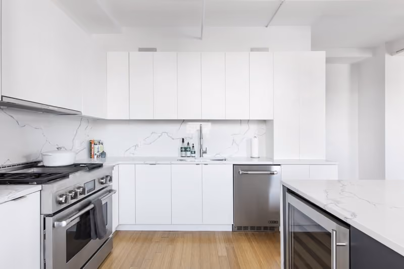 Renovated interior of a loft kitchen at BellTel Lofts at 365 Bridge Street in Downtown Brooklyn, by Gallery KBNY (view 5)
