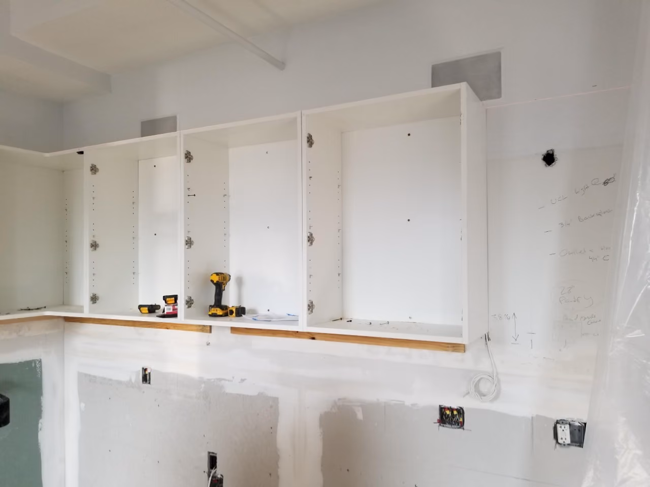 Construction in progress during a loft kitchen renovation at BellTel Lofts at 365 Bridge Street in Downtown Brooklyn, by Gallery KBNY (view 4)