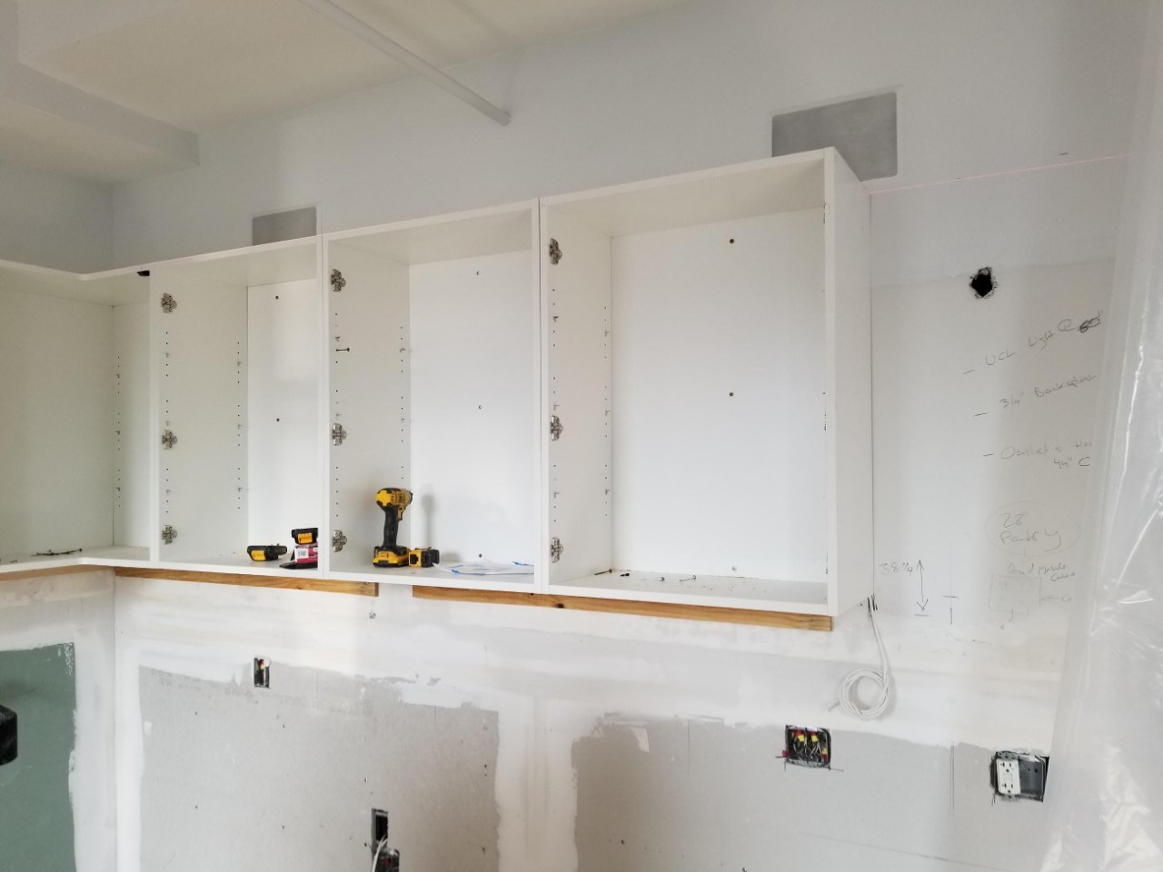 Construction in progress during a loft kitchen renovation at BellTel Lofts at 365 Bridge Street in Downtown Brooklyn, by Gallery KBNY (view 4)