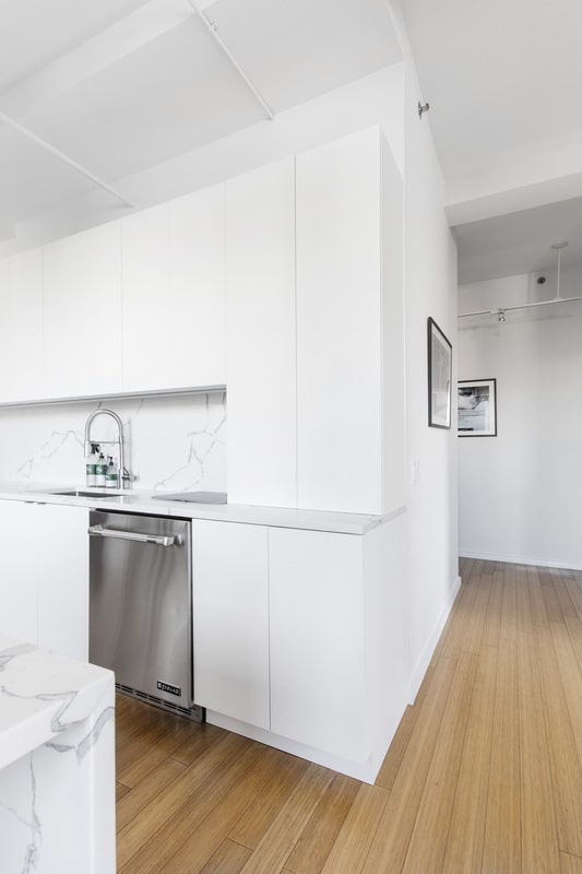 Renovated interior of a loft kitchen at BellTel Lofts at 365 Bridge Street in Downtown Brooklyn, by Gallery KBNY (view 6)