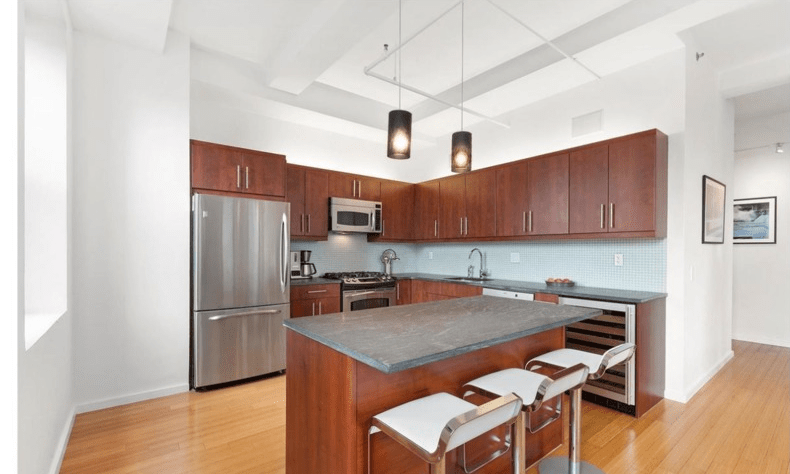 Construction in progress during a loft kitchen renovation at BellTel Lofts at 365 Bridge Street in Downtown Brooklyn, by Gallery KBNY (view 1)