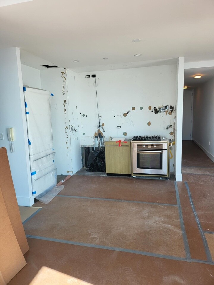 Pre-renovation or in-progress view of a condo renovation at 388 Bridge Street in Downtown Brooklyn, by Gallery KBNY (view 1)