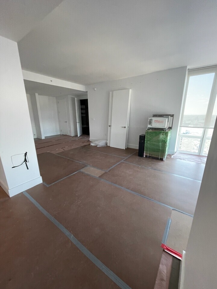 Pre-renovation or in-progress view of a condo renovation at 388 Bridge Street in Downtown Brooklyn, by Gallery KBNY (view 3)