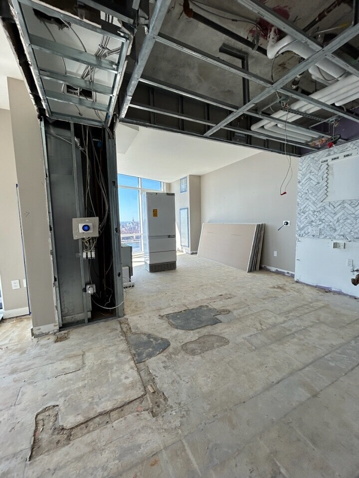 Pre-renovation or in-progress view of a condo renovation at 21 India Street in Greenpoint, Brooklyn, by Gallery KBNY (view 1)