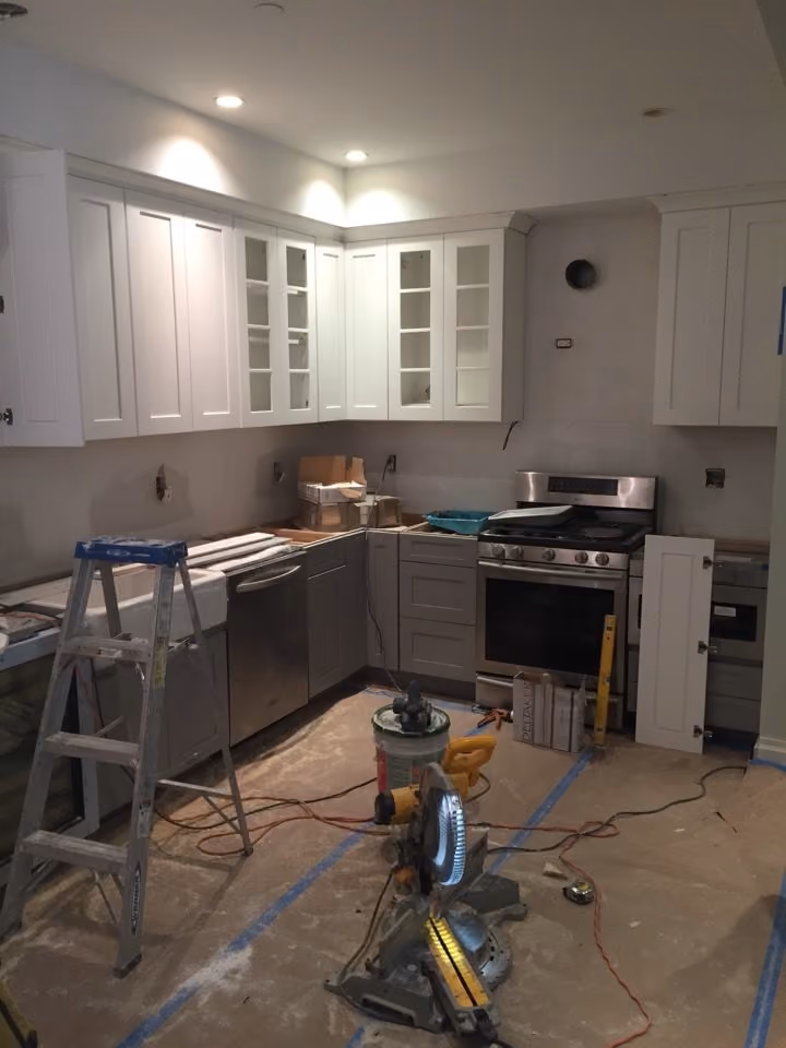 Pre-renovation or in-progress view of a pre-war condo kitchen and bathroom renovation at 61 Carroll Street in Carroll Gardens, Brooklyn, by Gallery KBNY (view 2)