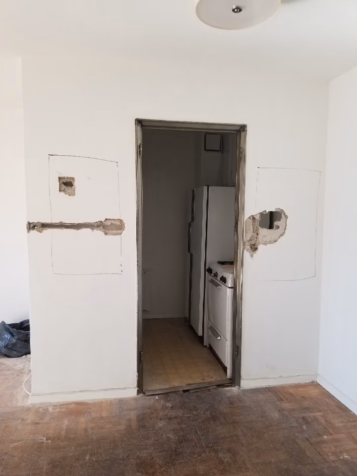 Pre-renovation or in-progress view of a post-war condo renovation at 61 Jane Street in the West Village, Manhattan, by Gallery KBNY (view 1)