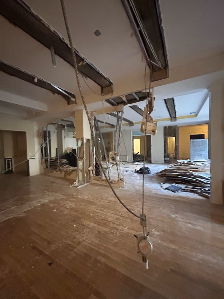 Pre-renovation or in-progress view of a pre-war condo renovation at The Chelsea Mercantile at 252 Seventh Avenue in Chelsea, Manhattan, by Gallery KBNY (view 1)