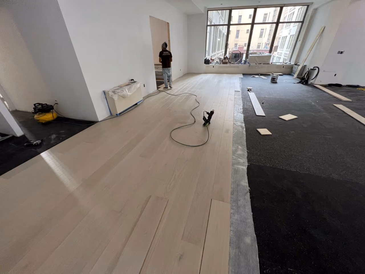 Pre-renovation or in-progress view of a pre-war condo renovation at The Chelsea Mercantile at 252 Seventh Avenue in Chelsea, Manhattan, by Gallery KBNY (view 13)
