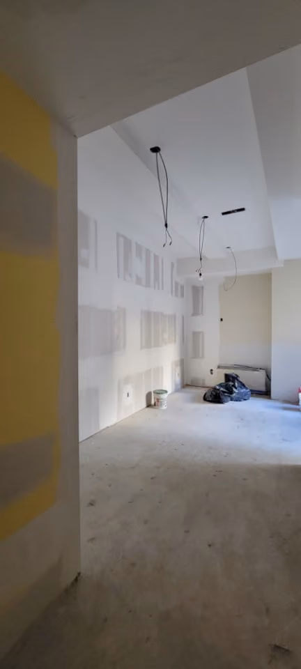 Pre-renovation or in-progress view of a pre-war condo renovation at The Chelsea Mercantile at 252 Seventh Avenue in Chelsea, Manhattan, by Gallery KBNY (view 11)