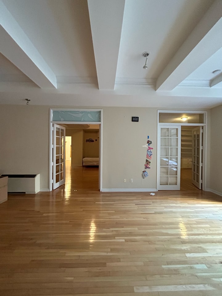 Interior before a pre-war condo renovation at The Chelsea Mercantile at 252 Seventh Avenue in Chelsea, Manhattan, by Gallery KBNY (view 1)
