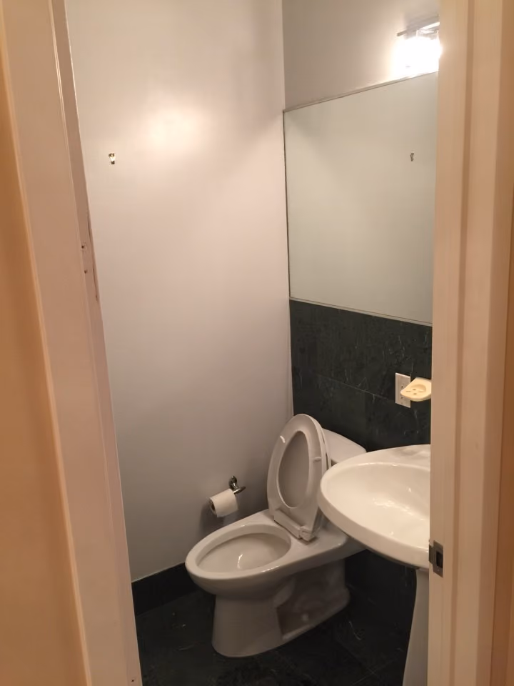Interior before a post-war co-op pied-a-terre renovation at International Plaza at 303 East 43rd Street in Turtle Bay, Manhattan, by Gallery KBNY (view 1)