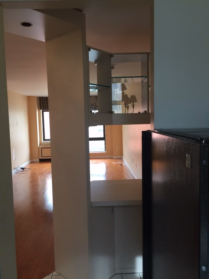 Interior before a post-war co-op pied-a-terre renovation at International Plaza at 303 East 43rd Street in Turtle Bay, Manhattan, by Gallery KBNY (view 3)