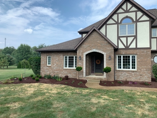 Professional lawn repair service revitalizing damaged grass in Uniontown, OH.