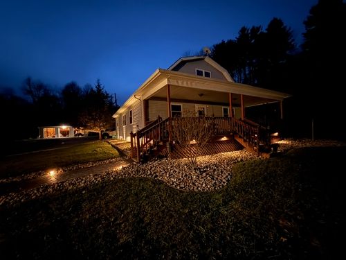 Motion-activated security lighting enhancing safety around a home’s exterior.