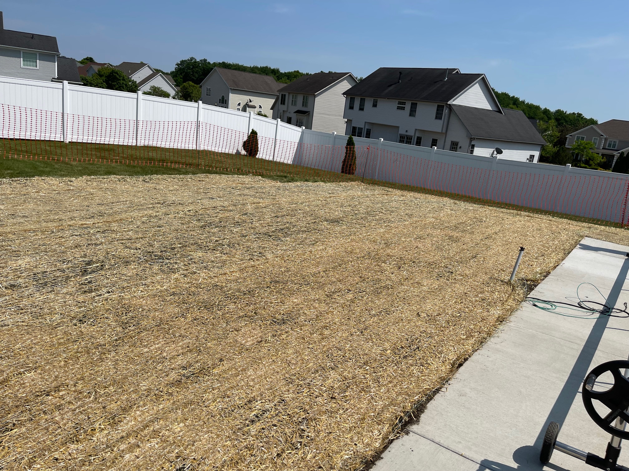 Professional lawn installation with healthy, green grass growing evenly in Uniontown, OH.