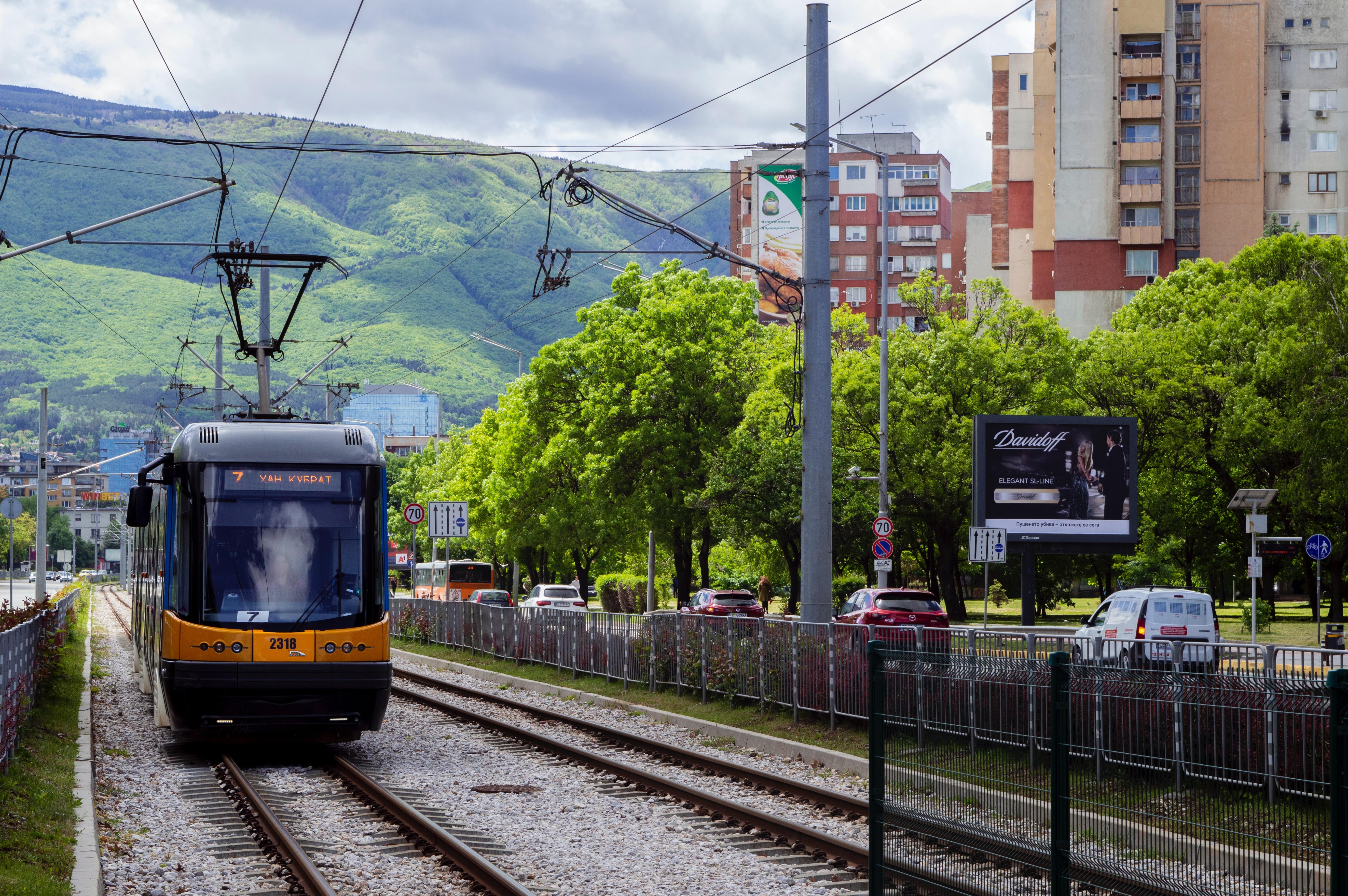 train bus cars in city