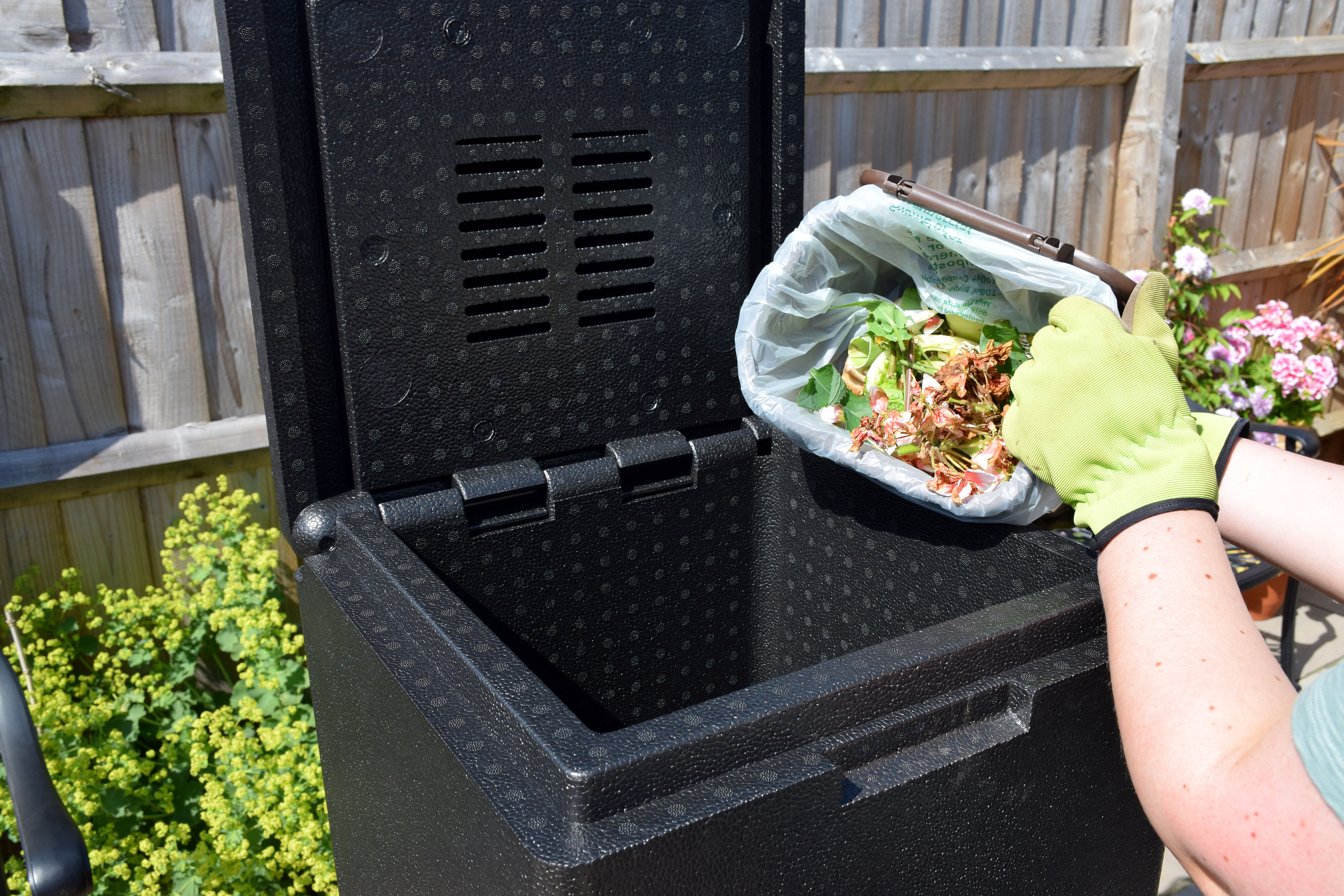 Food waste being added to a HOTBIN composter
