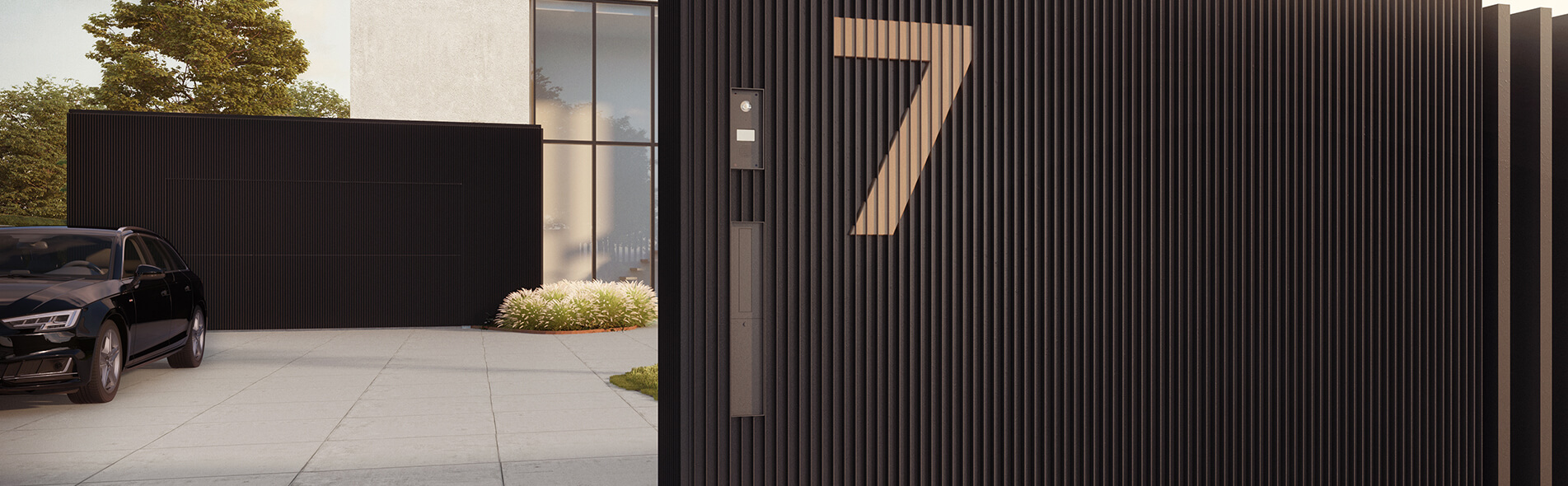 Moderne zwarte architectuur gevelbekleding met auto en verticale houten lamellen