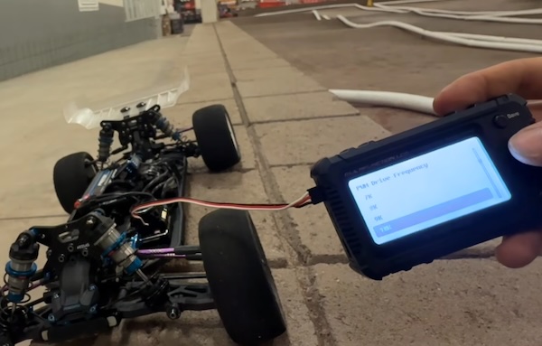 What does the "throttle frequency" setting on an RC car ESC do?