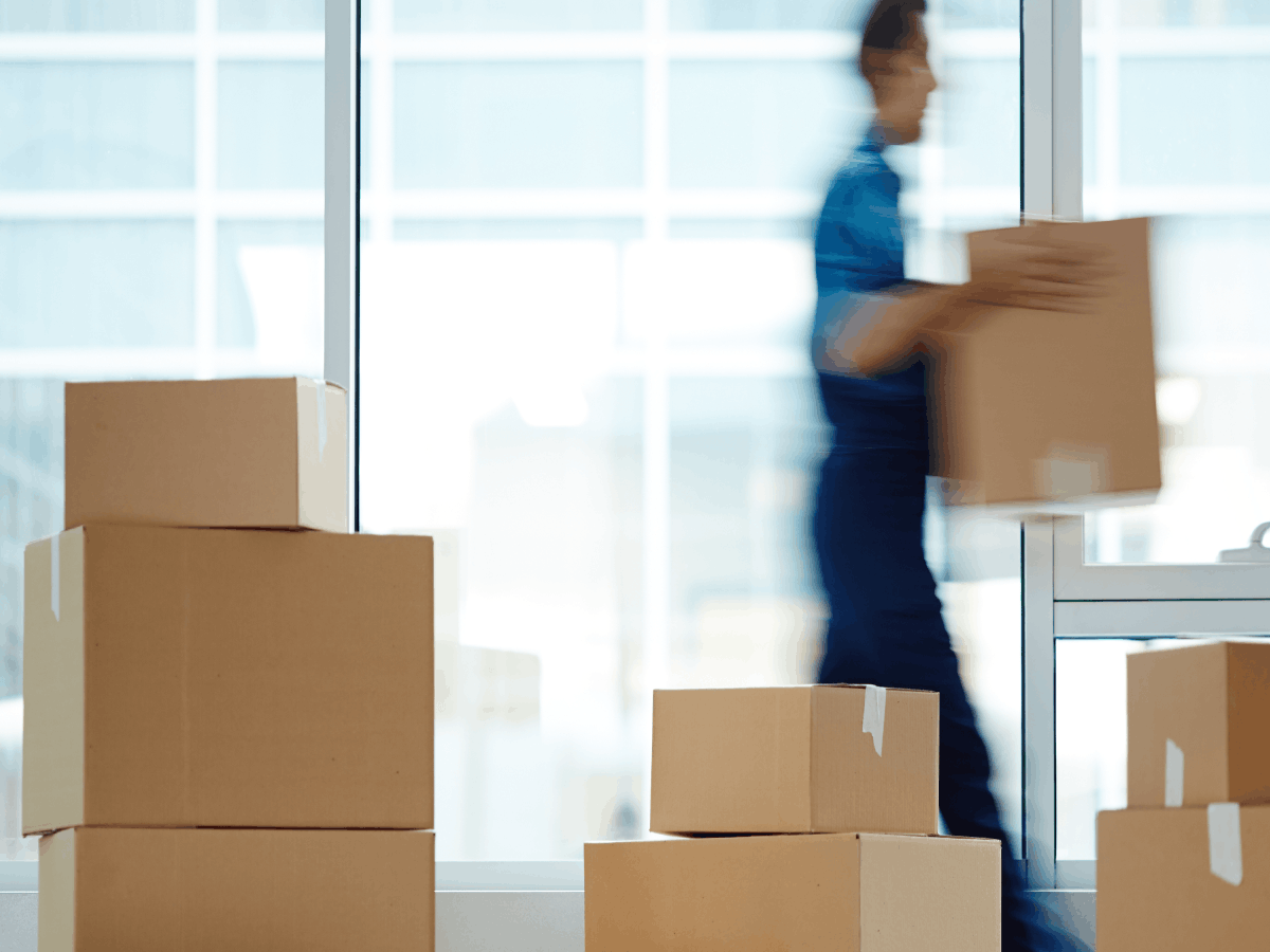 Family Moving with loads of boxes Outside