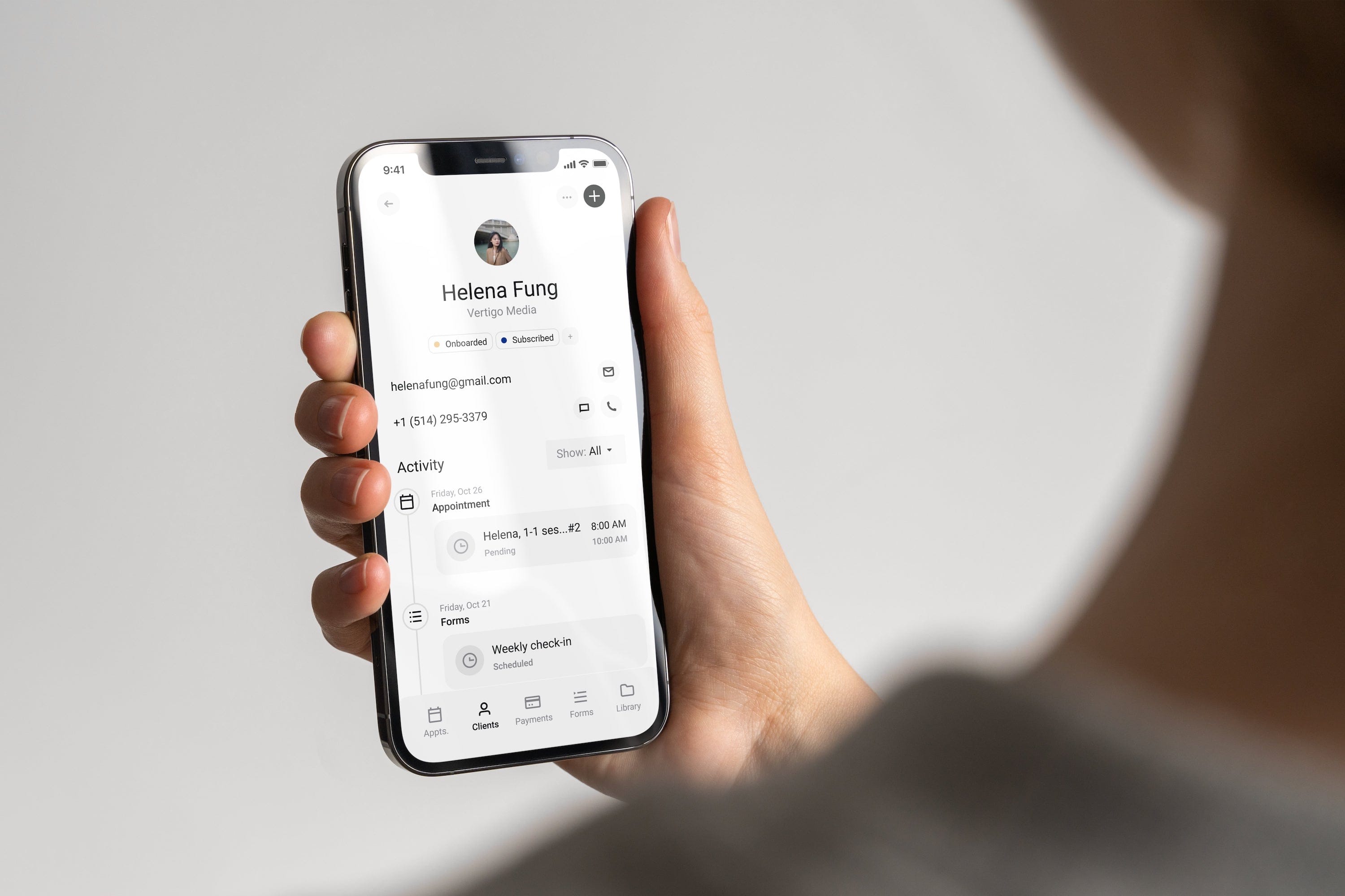 An image of a person with the Practice mobile app in their hand