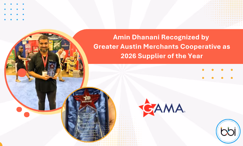 Amin Dhanani Recognized by Greater Austin Merchants Cooperative as 2026 Supplier of the Year, holding the star trophy at a trade show, with GAMA logo