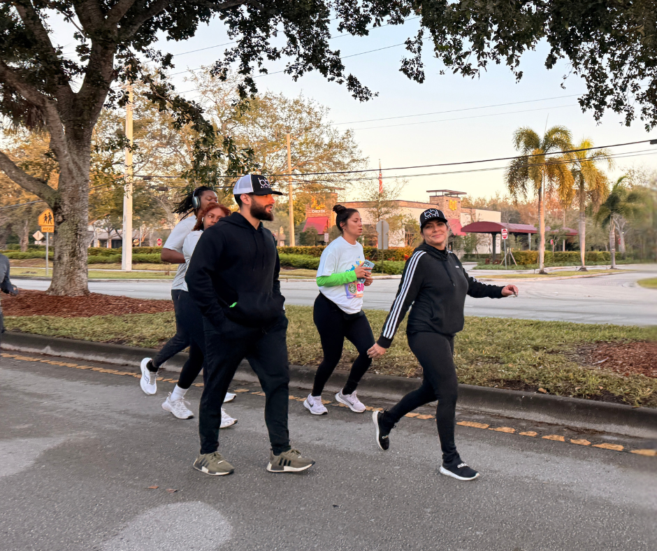 Group of runners on a paved road