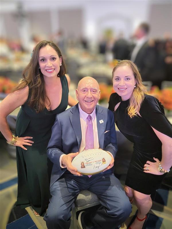 Dick Vitale with BBI's Christina Jackson, Director of Marketing and Communications, and Laura Holland, SVP Grocery Channel